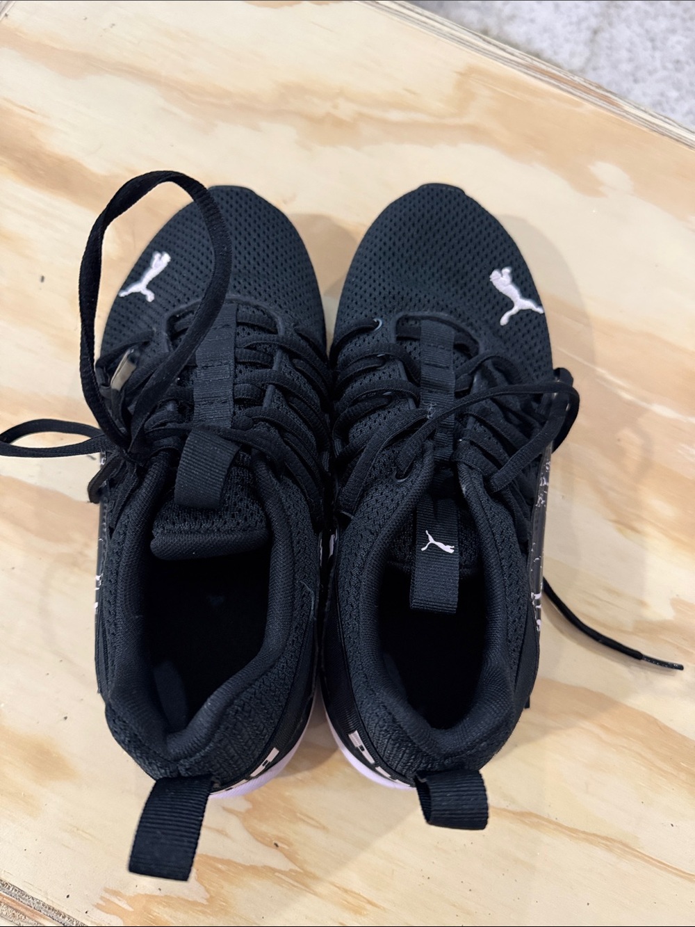 Puma Black Sneakers with Pink Logo Accent